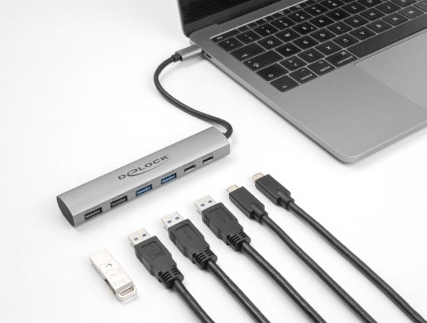 Delock 6 portin USB-keskitin, jossa on 4 x USB Type-A-liitäntä ja 2 x USB Type-C-liitäntä
