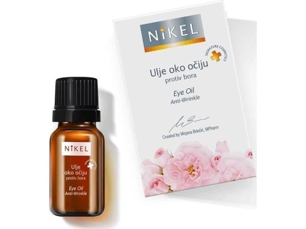 Nikel ville rose-olje under øynene mot rynker