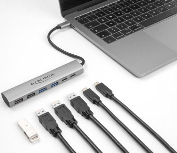 Delock 6 portin USB-keskitin, jossa on 4 x USB Type-A-liitäntä ja 2 x USB Type-C-liitäntä