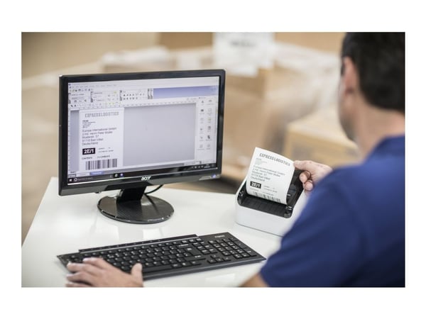 Brother QL-1110NWBc - Etikettskriver - direktetermisk - Rull (10,36 cm) - 300 x 300 dpi - inntil 110 mm/sek - Bluetooth 5.2, USB, LAN, Wi-Fi(n) - k...