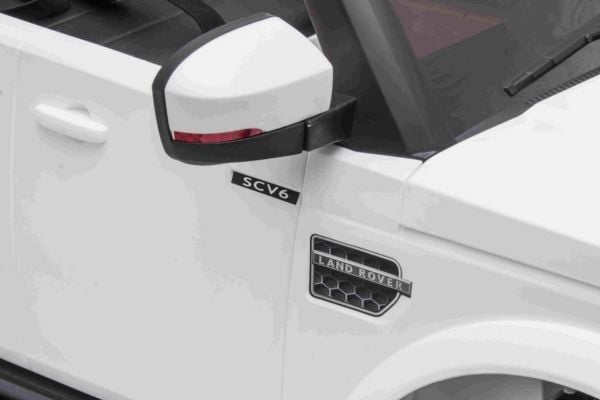 Ramiz-kjøretøy Land Rover Discovery hvit