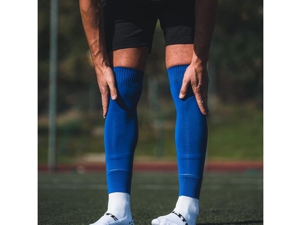 Proskary fotball sleeves/benbeskyttere blå/royal blue for voksne 155–195 cm