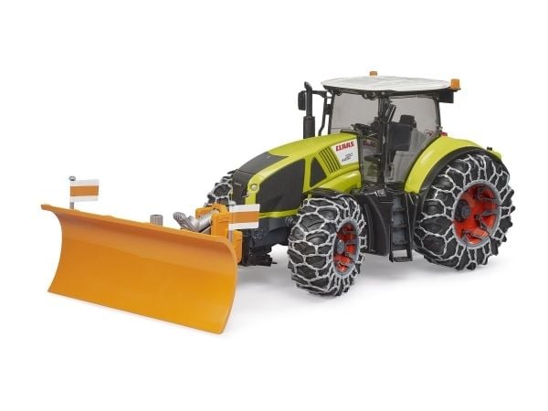 Claas Axion 950 with snow chains and plow blade