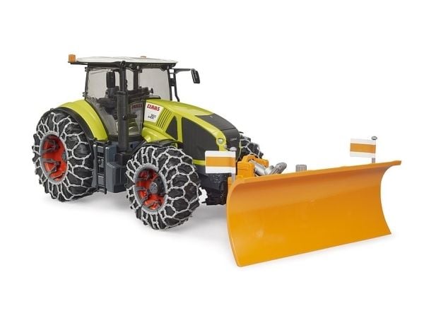 Claas Axion 950 with snow chains and plow blade