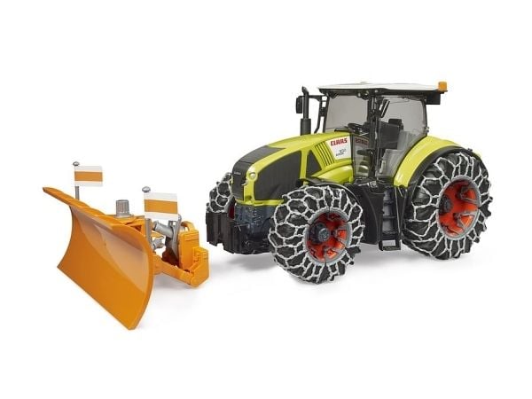 Claas Axion 950 with snow chains and plow blade