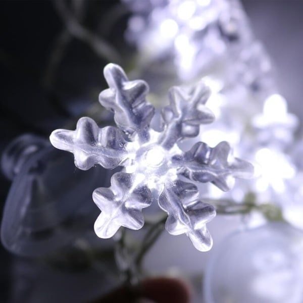 Jouluiset LED-lumihiutalevalot imukupeilla - Paristokäyttöiset
