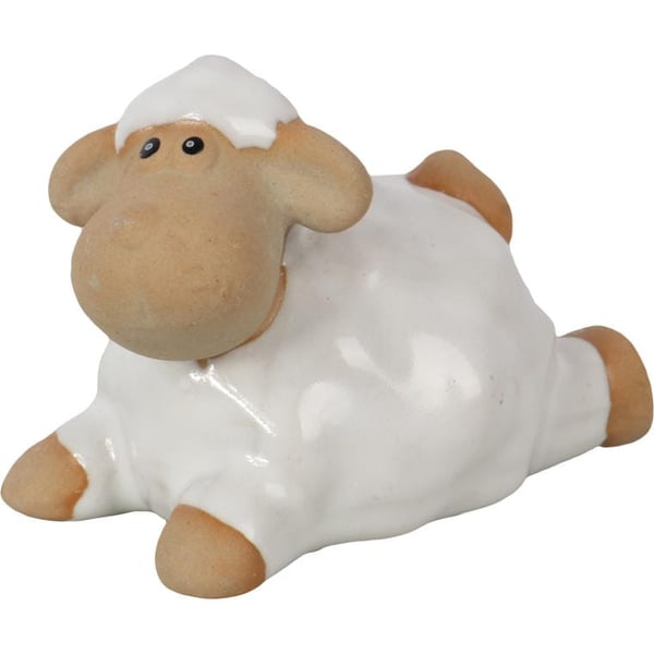 En charmig och vackert tillverkad liggande lamm-figurin