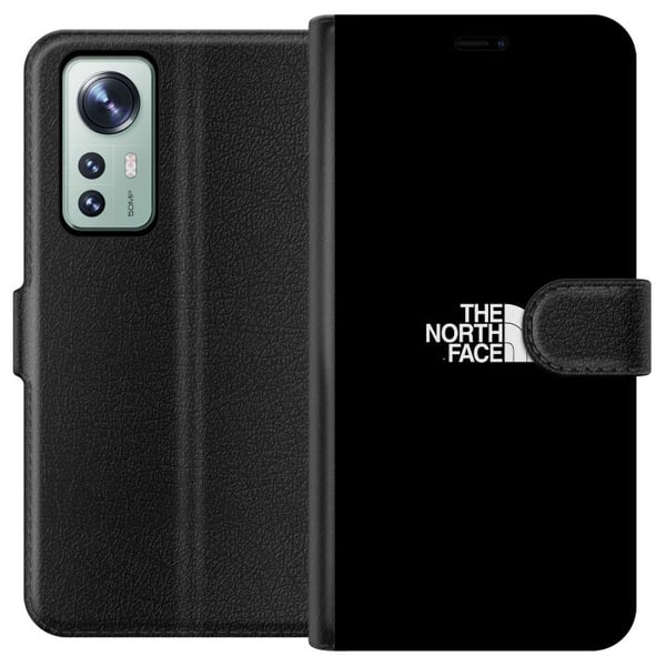 Yhteensopiva Lompakkokotelo Xiaomi 12 The North Face -logo mustavalkoisena, ajattomassa ulkoiluhenkisessä designissa, joka symboloi voimaa, vapautta