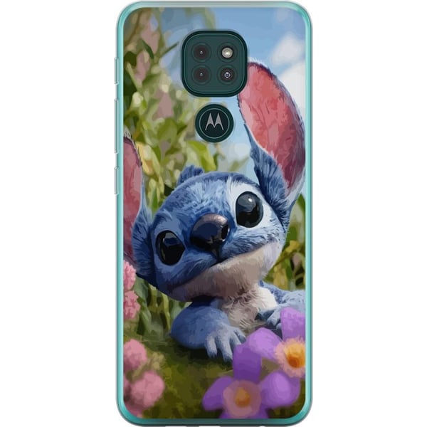 Kompatibel Mobilcover til Motorola Moto G9 Play Blå tegnet figur inspireret af Stitch i naturlige omgivelser med blomster og et sødt udtryk, perfekt