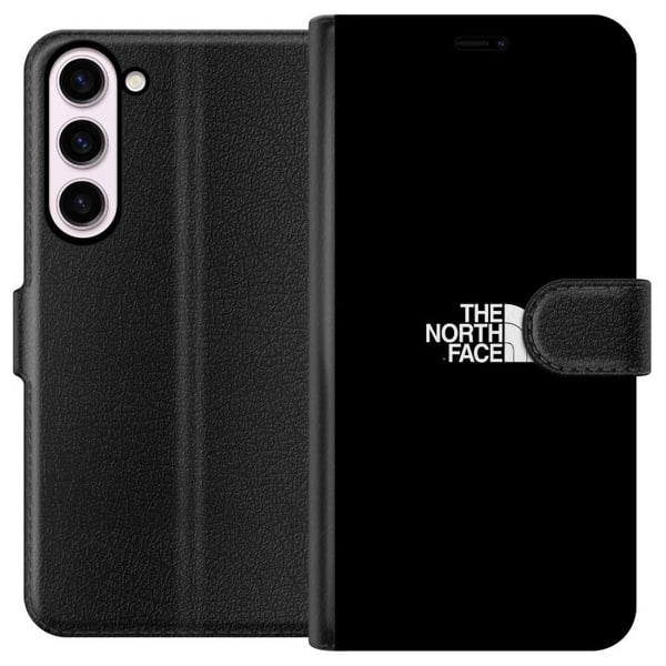 Kompatibelt Lommeboketui til Samsung Galaxy S23+ The North Face-logo i svart-hvitt, tidløst friluftsinspirert design som symboliserer styrke, frihet