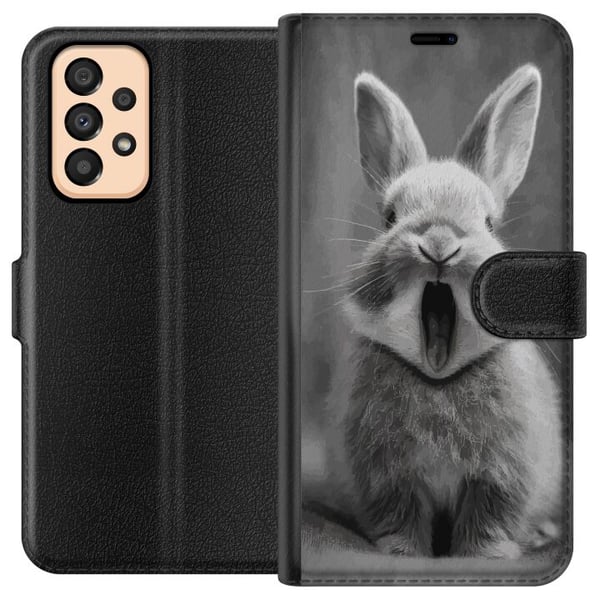 Yhteensopiva Lompakkokotelo Samsung Galaxy A33 5G Suloinen mustavalkoinen kani istuu edestäpäin suu avoinna kuin haukotellen, mikä luo kuvaan viehätt Yhteensopiva Lompakkokotelo Samsung Galaxy A33 5G Suloinen mustavalkoinen kani istuu edestäpäin suu avoinna kuin haukotellen, mikä luo kuvaan viehätt