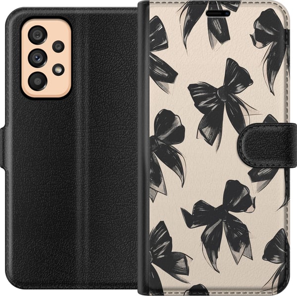 Yhteensopiva Lompakkokotelo Samsung Galaxy A53 5G Mustat rusetit beigen taustan päällä, elegantti ajaton design pehmeillä kontrasteilla ja ylellisell