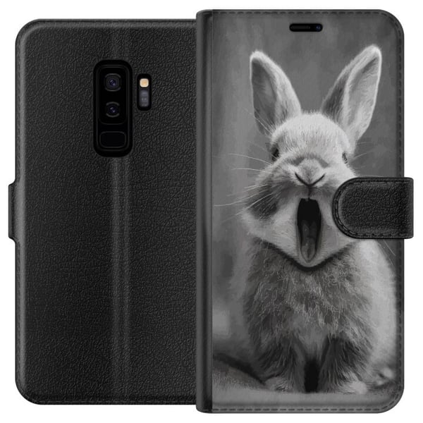 Kompatibelt Plånboksfodral till Samsung Galaxy S9+ Bedårande kanin i svartvitt sitter framifrån med munnen öppen som i en gäspning vilket skapar char Kompatibelt Plånboksfodral till Samsung Galaxy S9+ Bedårande kanin i svartvitt sitter framifrån med munnen öppen som i en gäspning vilket skapar char