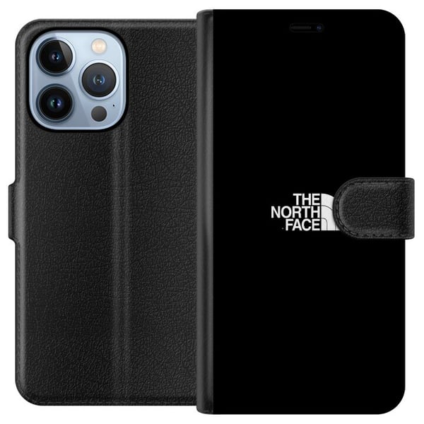 Yhteensopiva Lompakkokotelo Apple iPhone 13 Pro The North Face -logo mustavalkoisena, ajattomassa ulkoiluhenkisessä designissa, joka symboloi voimaa,