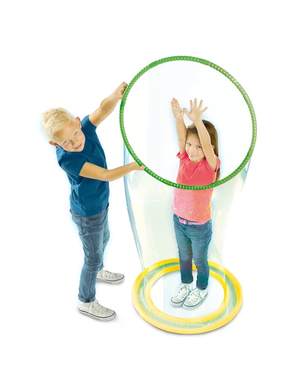 SES Creative Standing in a mega bubble Saippuakuplat