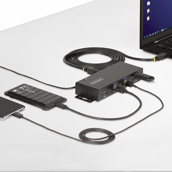 StarTech.com Hanterad USB-hubb med 7 portar och 7x USB-A, robust industrihölje i metall, ESD- och överspänningsskydd, monterbar på vägg/skrivbord/skena, USB 3.0/3.1/3.2 Gen 1 5 Gbps