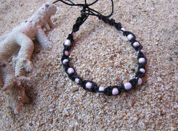 Armband lila pärlor