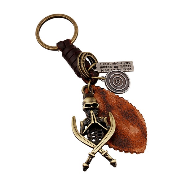 Vacker nyckelring i Steampunk-stil -  knivar och skelette