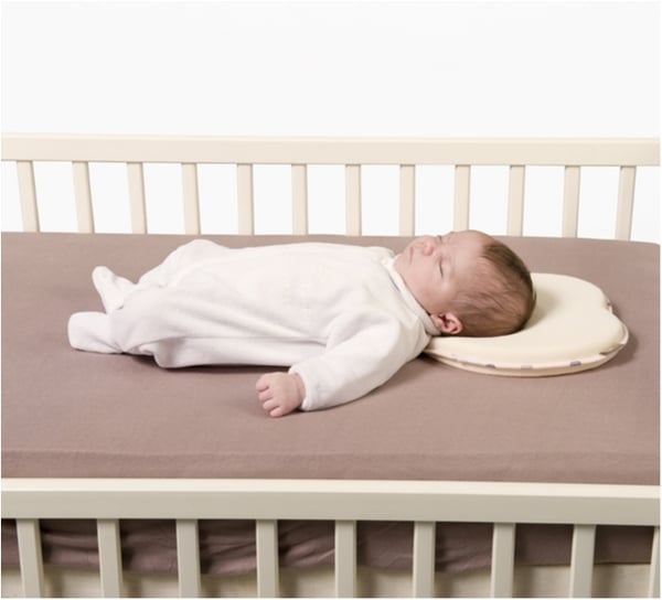 Ergonomisk babypute, unngå flatt bakhode