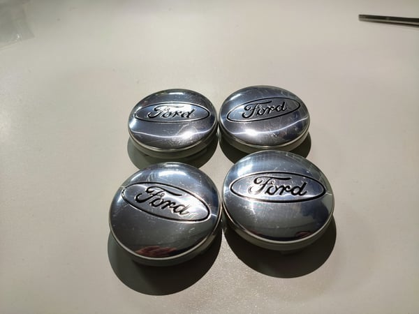 F04 - 54MM 4-pack Centrumkåpor Ford