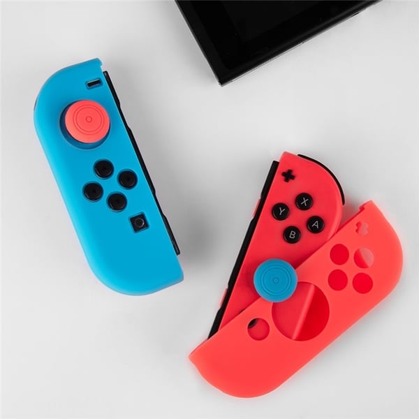 Silikondeksel kompatibelt med Nintendo Switch + tommelgrepsbeskytter - Rød/blå