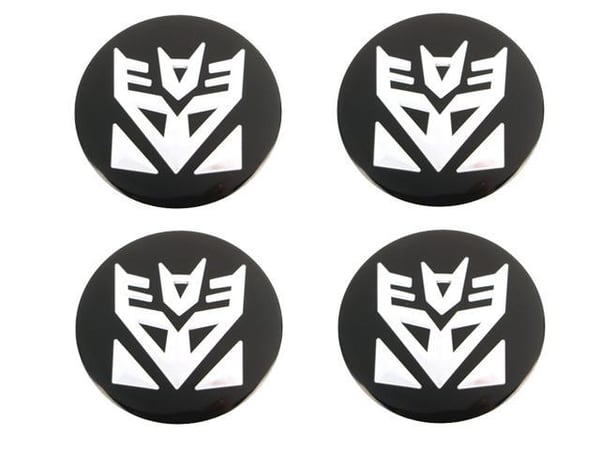 Transformers-tunnukset keskikuppeihin, pyörännapakapseleihin, vanteisiin, 4 kpl, stailaus. Transformers-tunnukset keskikuppeihin, pyörännapakapseleihin, vanteisiin, 4 kpl, stailaus.