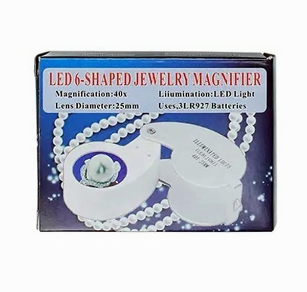 Suurennuslasi 40x25mm, jossa on vahva LED-valo ja paristot .