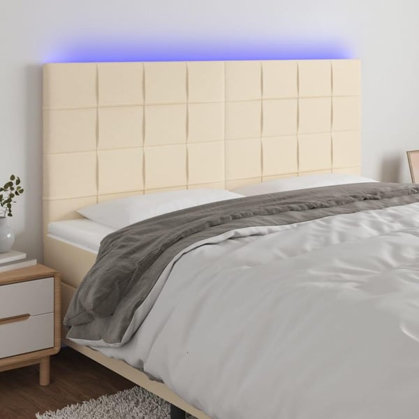 vidaXL sengegavl med LED-lys 200x5x118/128 cm stof Cremefarvet