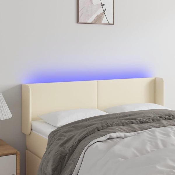 vidaXL sengegavl med LED-lys 147x16x78/88 cm kunstlæder cremefarvet