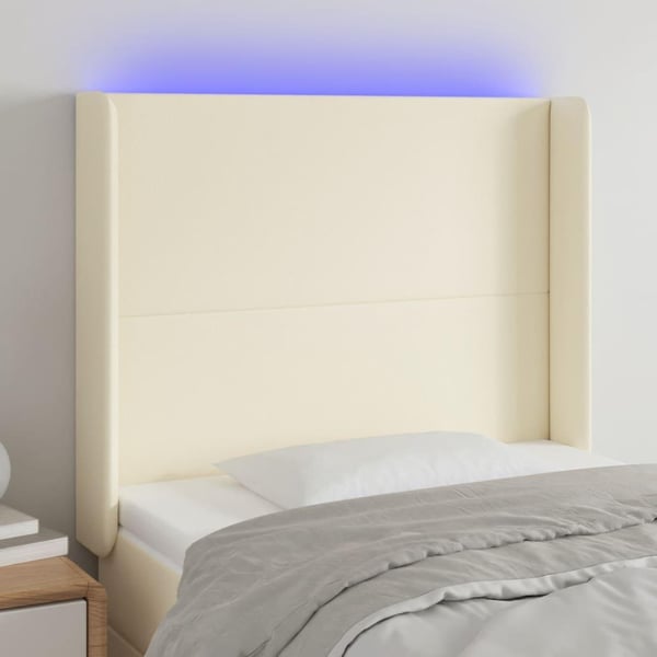 vidaXL sengegavl med LED-lys 83x16x118/128 cm kunstlæder cremefarvet