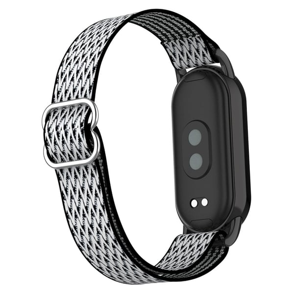 Xiaomi Smart Band 9 / 8 Nylon Wave Pattern Watch Strap Metal Clasp säädettävä ranneke - Musta / Valkoinen Xiaomi Smart Band 9 / 8 Nylon Wave Pattern Watch Strap Metal Clasp säädettävä ranneke - Musta / Valkoinen