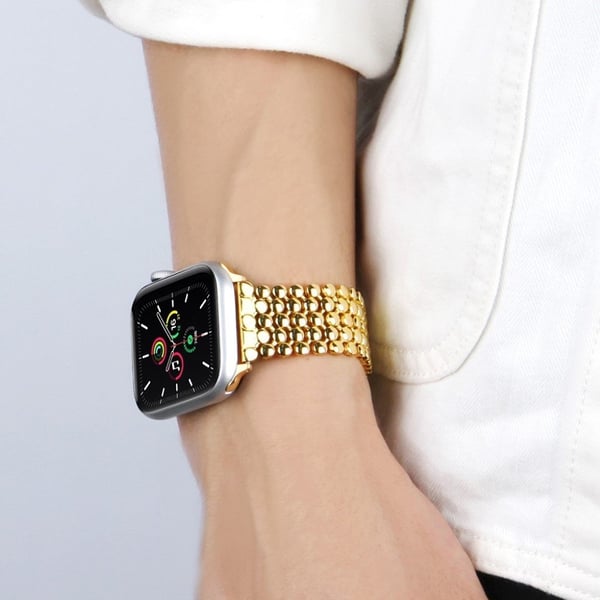 Apple Watch 44 mm klokkerem i honeycomb-aluminium - Gull