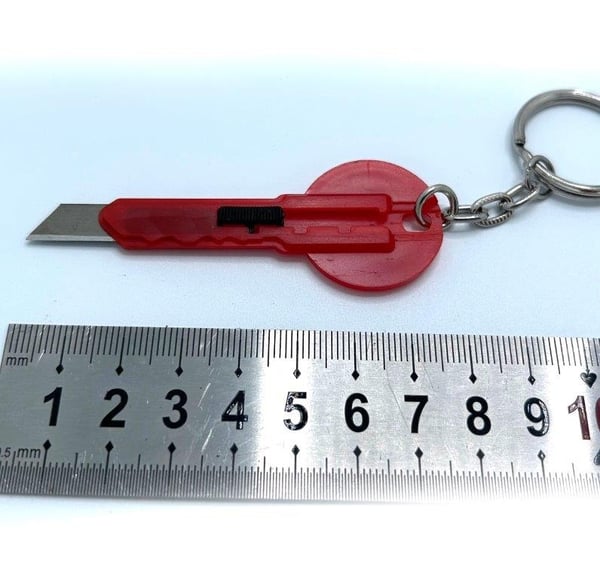 Nyckelring med paketkniv - vit