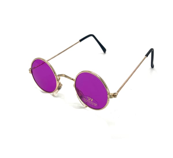 Runde solbriller i guld med pink glas