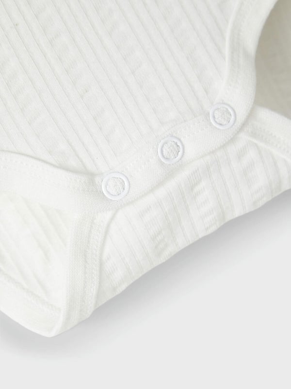 Nimeä se Baby Body White röyhelöllä, koko 74