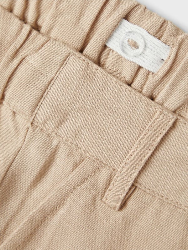 Nimeä minishortsit beige, koko 104