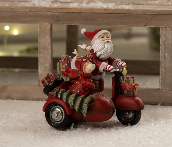 Julemand på scooter m/rensdyr