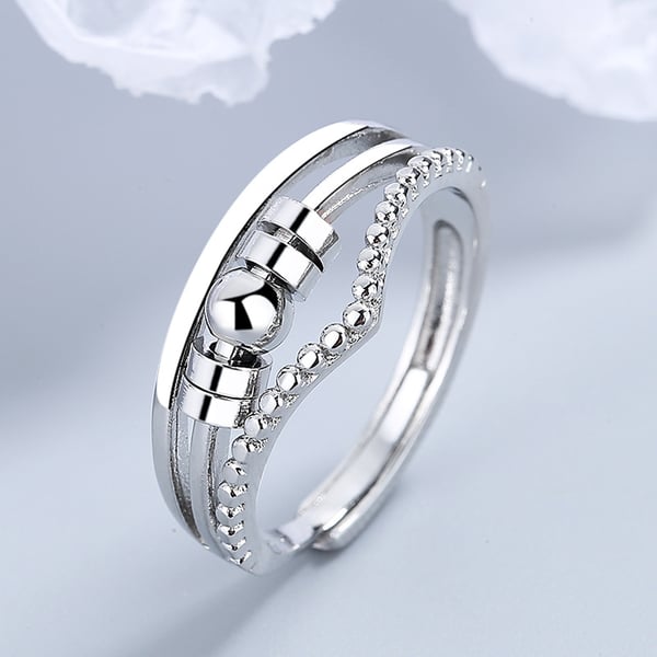 Justerbar antistressring med roterbare perler Silver