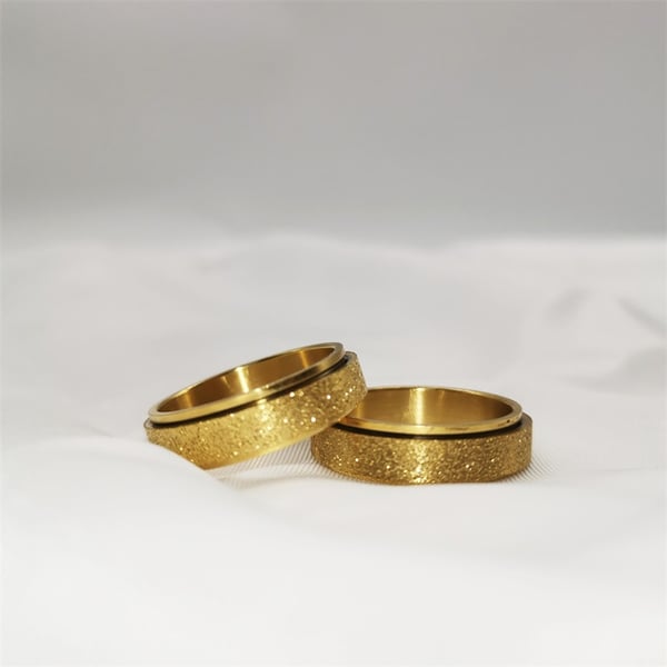Glatt antistressring i rustfritt stål Gold