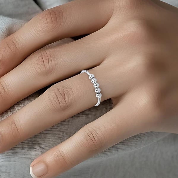 Justerbar antistressring med roterbare perler Silver