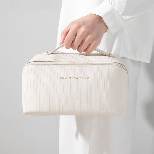 Romslig toalett/sminkeveske Beige