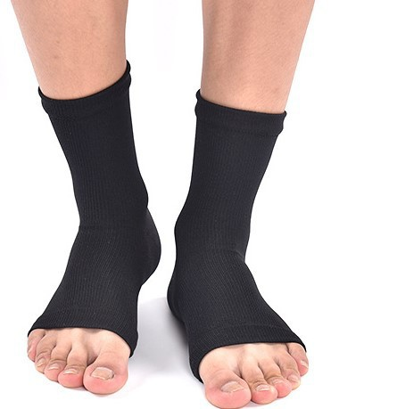 1 pari nilkan paineenkevennyssukkia Black S/M