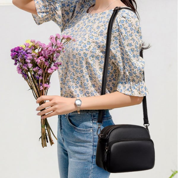 Crossbody-veske i ekte skinn - stilig og romslig