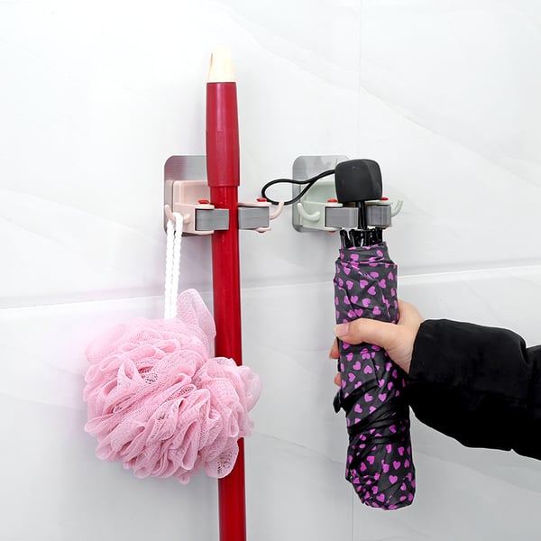 Veggmontert moppholder med selvklebende tape