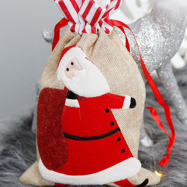 Julklappssäck liten med tomte