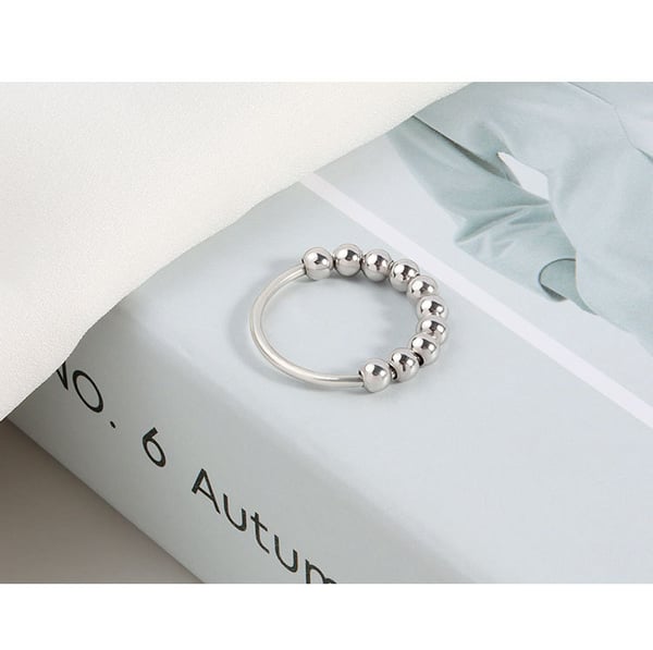Antistressring med 10 roterbare perler kobberplatina 20.5 mm