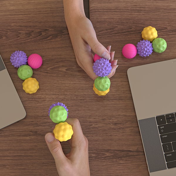 Antistressbolde med etui - 4-pak farverig