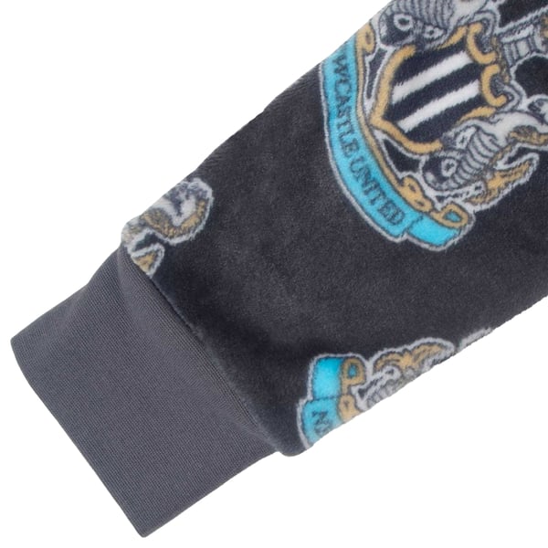 Newcastle United FC Childrens/Kids Crest Fleece All-In-One Nightwear