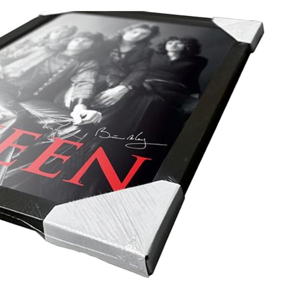 Queen-yhtyeen kehystetty juliste