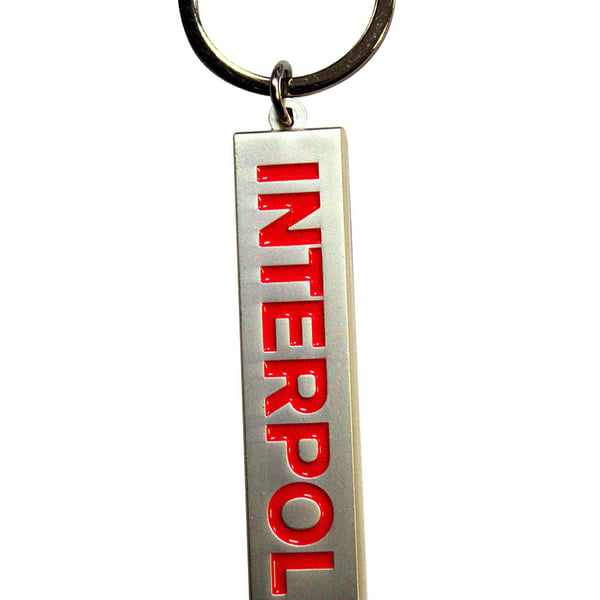 Interpol Text Logo Enamel Keyring